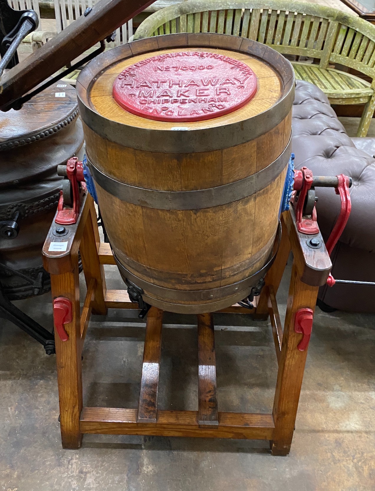 An early 20th century iron bound coopered oak butter churn, by Hathaway of the Chippenham Cheese Factory, Chippenham, Wiltshire, height 114cm *Please note the sale commences at 9am.